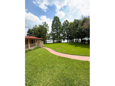 On Lake Saint John, this lovely property offers a stunning - photo 7