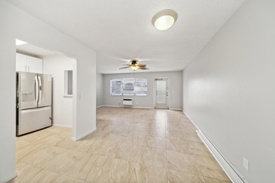 Welcome to this updated 1-bedroom, 1.5-bathroom condo is - photo 7
