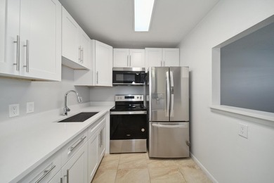 Welcome to this updated 1-bedroom, 1.5-bathroom condo is - photo 8