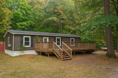 Hardy Dam Pond Home Sale Pending in Newaygo Michigan