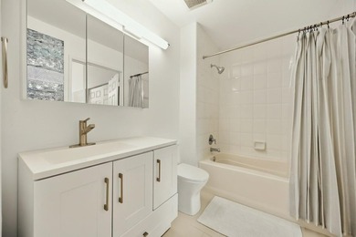 Updated 2BR/2BA corner residence with high ceilings, bright open - photo 11