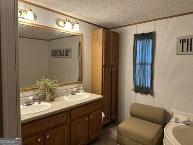 Experience lake living at its finest with this beautifully - photo 16