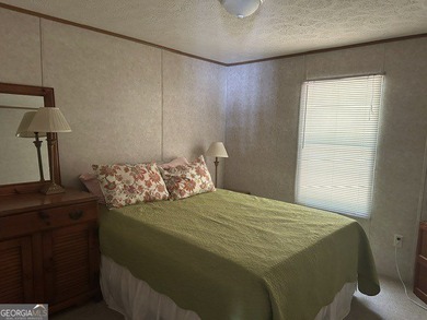 Experience lake living at its finest with this beautifully - photo 18