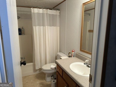 Experience lake living at its finest with this beautifully - photo 19