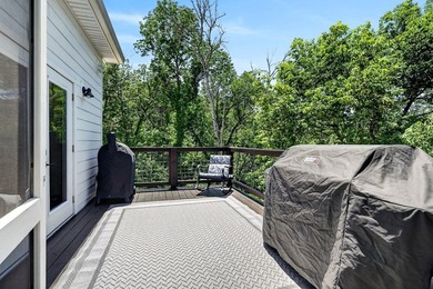 This waterfront lake home showcases an open floorplan and - photo 25