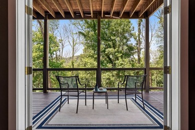 This waterfront lake home showcases an open floorplan and - photo 37