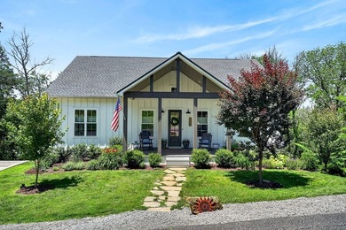 This waterfront lake home showcases an open floorplan and - photo 45