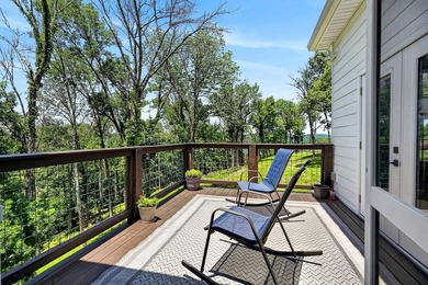 This waterfront lake home showcases an open floorplan and - photo 48