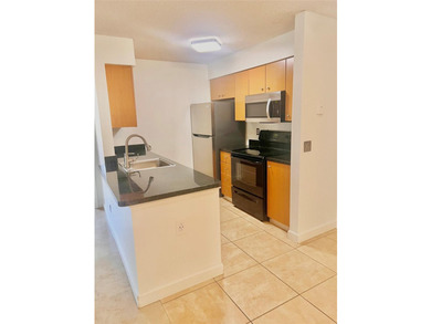 Vacant. all tile , granite countertop, 2 parking spaces - photo 8