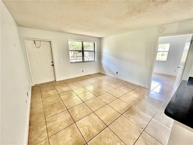 Vacant. all tile , granite countertop, 2 parking spaces - photo 10