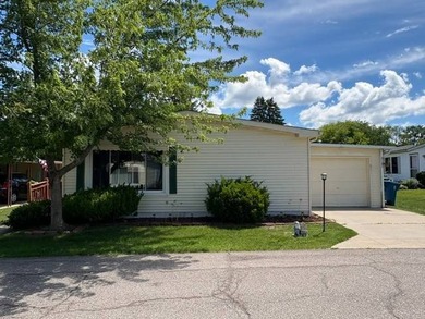 This 1,456 Square Foot Manufactured Home is Located in a - photo 1