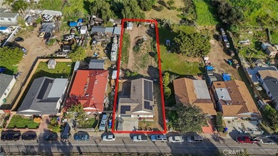 This beautifully updated 4-bedroom, 2-bathroom home with a 2-car - photo 1
