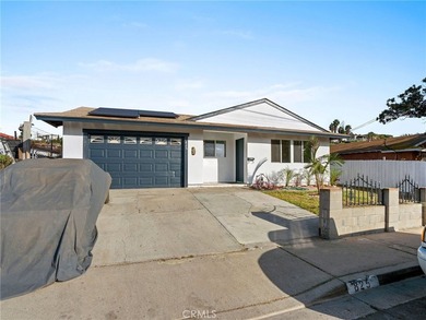 This beautifully updated 4-bedroom, 2-bathroom home with a 2-car - photo 2