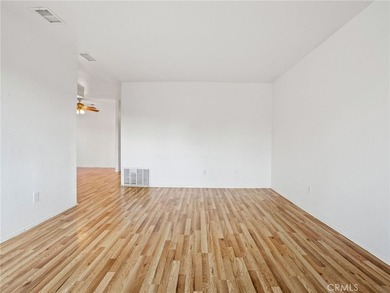 This beautifully updated 4-bedroom, 2-bathroom home with a 2-car - photo 5
