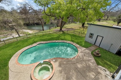 Set along the shoreline of Meadow Lake, this waterfront property - photo 2