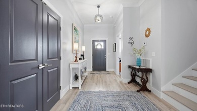 Welcome home to this beautifully designed five bedroom, two and - photo 4