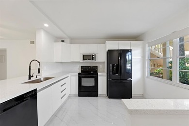 Fabulous ground level, bright just remodeled unit in the very