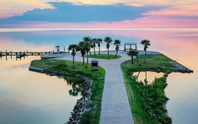 The Landing at Redfish Point is a gated coastal enclave where - photo 29