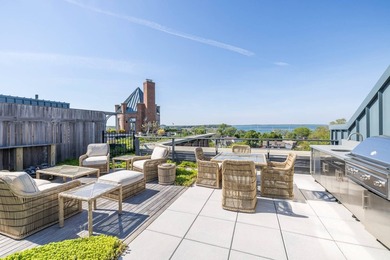 Perched high above Sag Harbor Village within the iconic and - photo 3