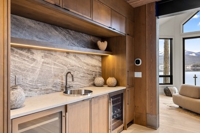 Indulge in exceptional lakefront living with 75 feet of private - photo 14