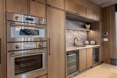 Indulge in exceptional lakefront living with 75 feet of private - photo 15