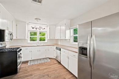 Set high atop a hill in the heart of East Hill, this classic - photo 15