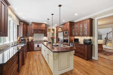 Perched along the golf course, this exceptional custom estate by - photo 18