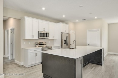 New Construction Custom Home in Desirable Port Malabar Unit 50 - photo 18