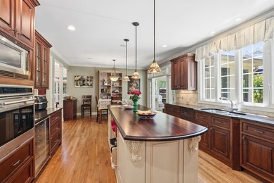 Perched along the golf course, this exceptional custom estate by - photo 20