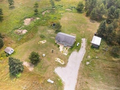 Set on 17 scenic acres in Michigan's Upper Peninsula, this - photo 22