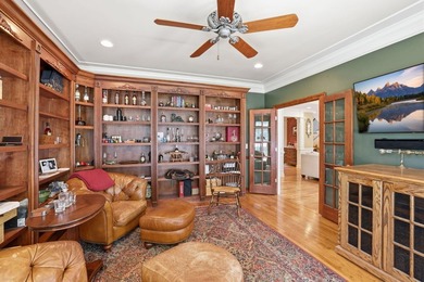 Perched along the golf course, this exceptional custom estate by - photo 25