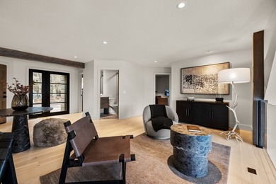 Indulge in exceptional lakefront living with 75 feet of private - photo 31