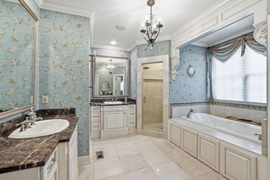 Perched along the golf course, this exceptional custom estate by - photo 32