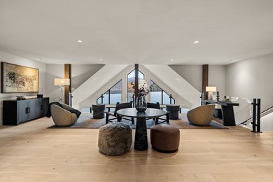 Indulge in exceptional lakefront living with 75 feet of private - photo 32
