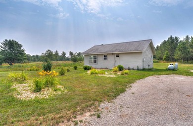 Set on 17 scenic acres in Michigan's Upper Peninsula, this - photo 33