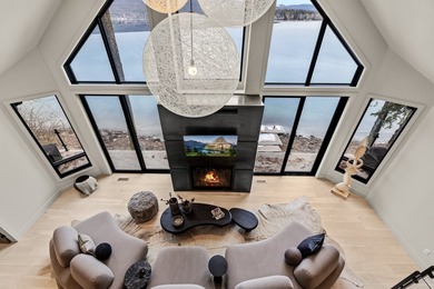Indulge in exceptional lakefront living with 75 feet of private - photo 34