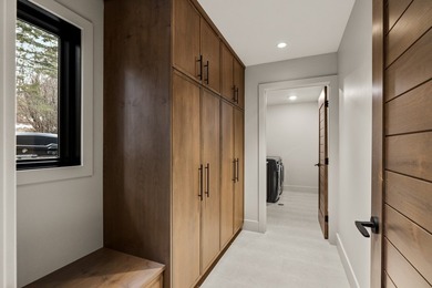 Indulge in exceptional lakefront living with 75 feet of private - photo 38