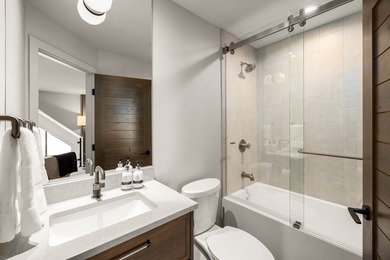 Indulge in exceptional lakefront living with 75 feet of private - photo 46
