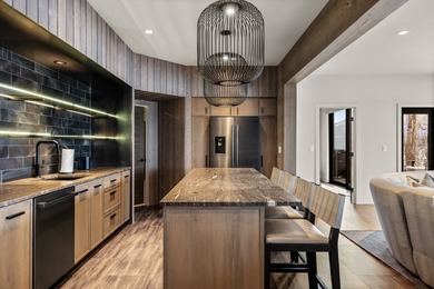 Indulge in exceptional lakefront living with 75 feet of private - photo 55
