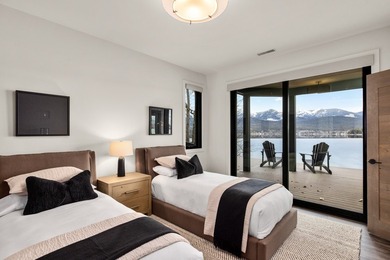 Indulge in exceptional lakefront living with 75 feet of private - photo 58