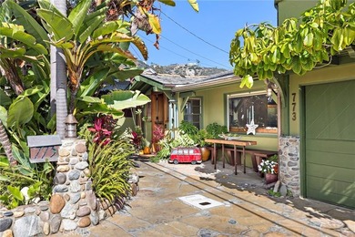 This beautifully maintained 4-bedroom, 3-bath home captures the - photo 1