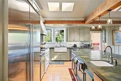 This beautifully maintained 4-bedroom, 3-bath home captures the - photo 6