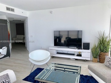 Experience elevated city living in this 2-bedroom, 2-bathroom + - photo 3