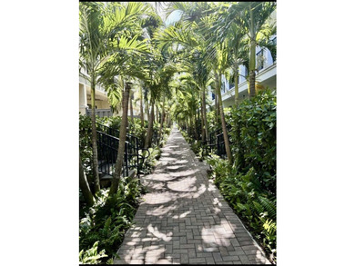 Welcome to this stunning tri-level Mediterranean-style townhome - photo 5