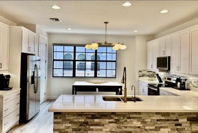 Welcome to this stunning tri-level Mediterranean-style townhome - photo 6