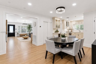 Nestled on a picturesque tree-lined street just steps from the - photo 12