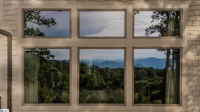 Some homes have a view. This one has a horizon. Sited on one of - photo 46