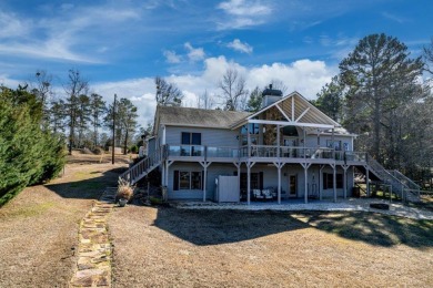 Don't miss out on this amazing home, It's on a little over an - Lake Home For Sale in Eatonton, Georgia