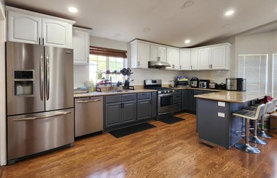 This charming 1998 Silvercrest home offers 1,734 square feet of - photo 5