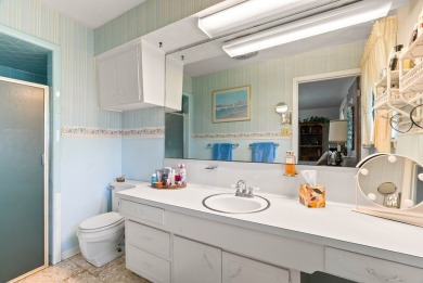 This home features a double lot and an oversized garage so you